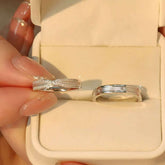 Romantic matching couple rings in silver, bow design with sparkling stones